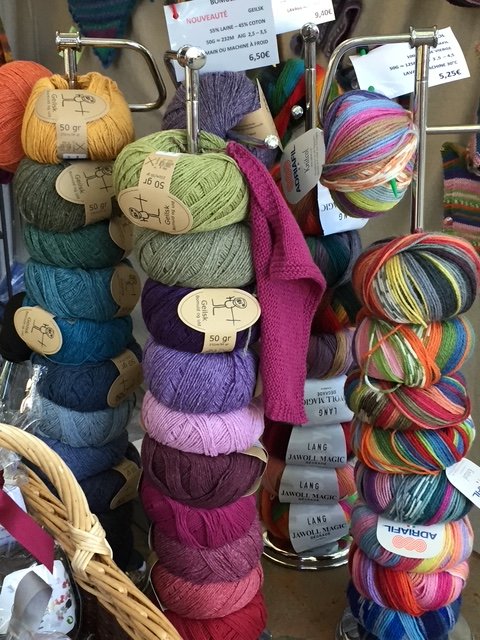 Skeins of yarn at a market stall